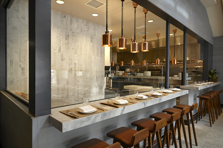 Counter seating with a view to the kitchen.