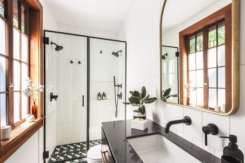 primary bathroom with large mirror