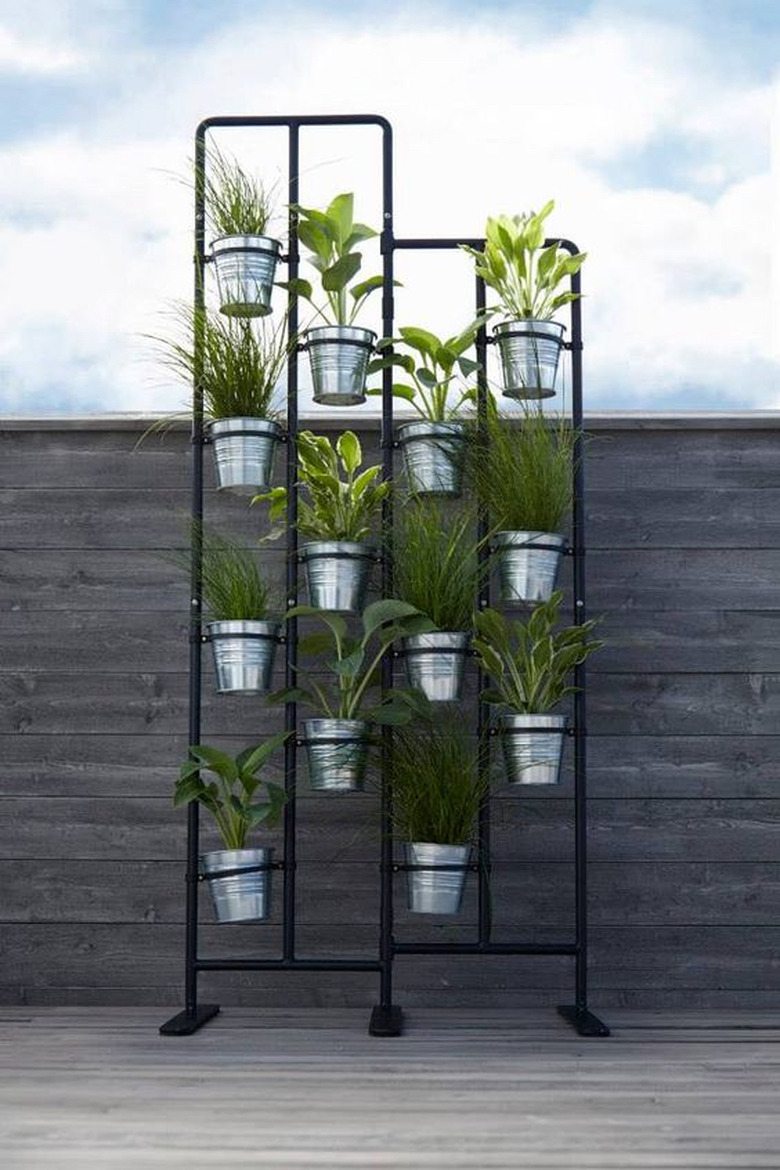 room divider idea for the living room with plants