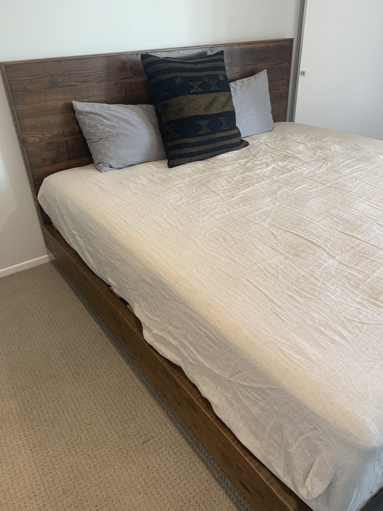 rustic bed frame in bedroom