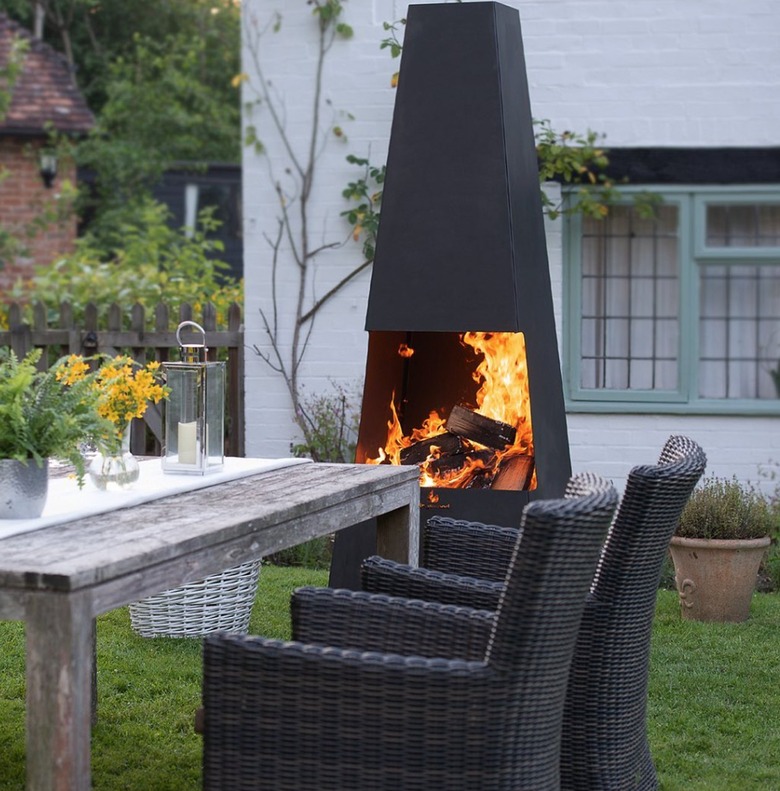 Outdoor dining area with firepit.