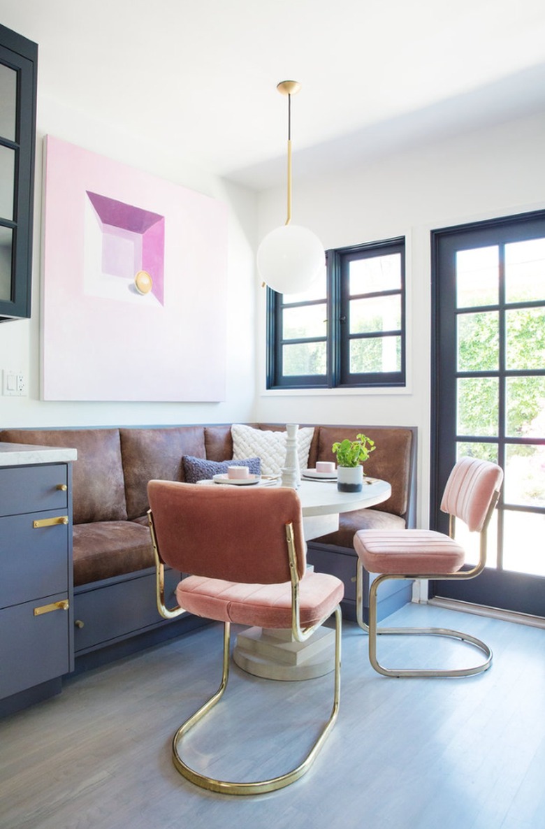 Banquette seating in kitchen with leather seats and chairs