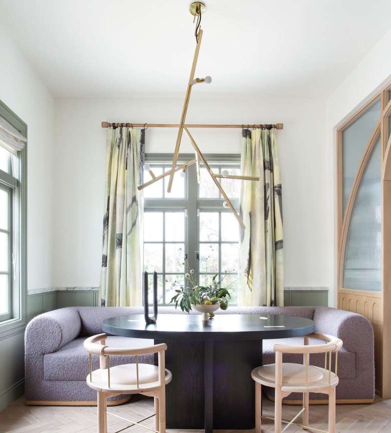 Banquette seating in apartment with lavender seats