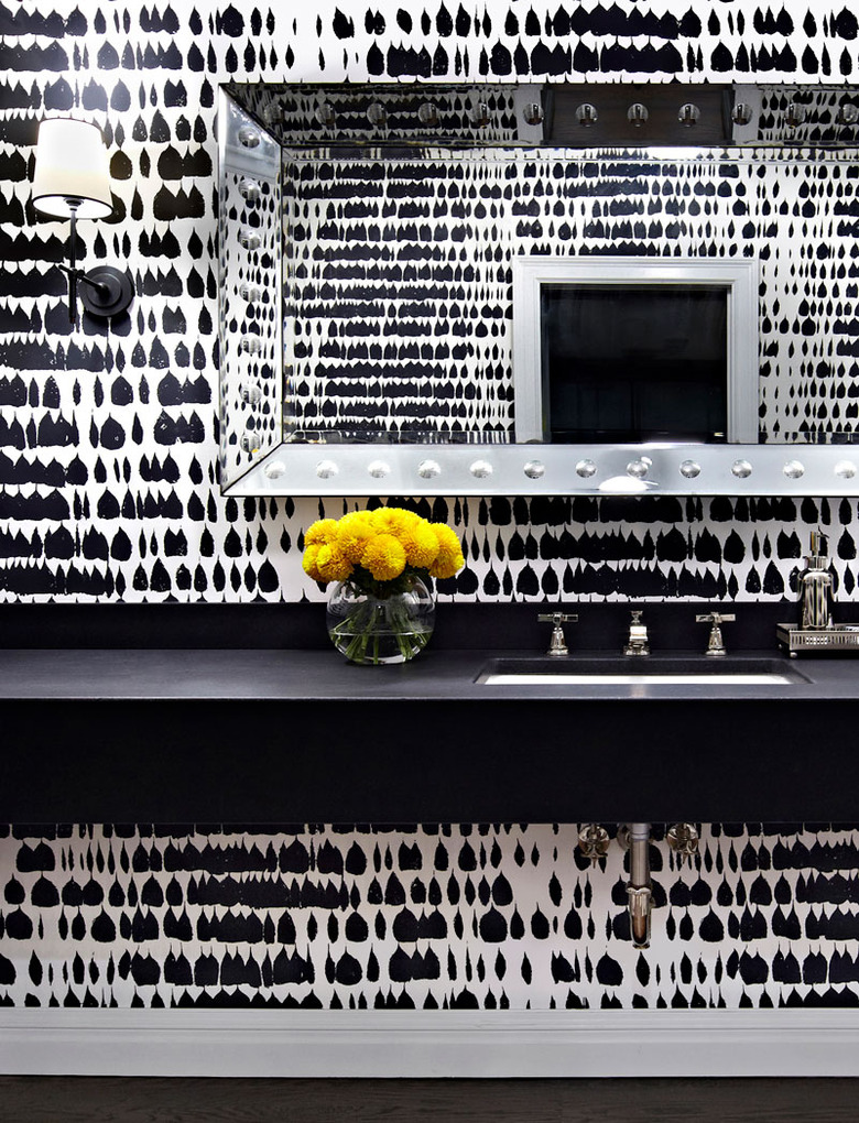 black and white basement bathroom idea with yellow flowers