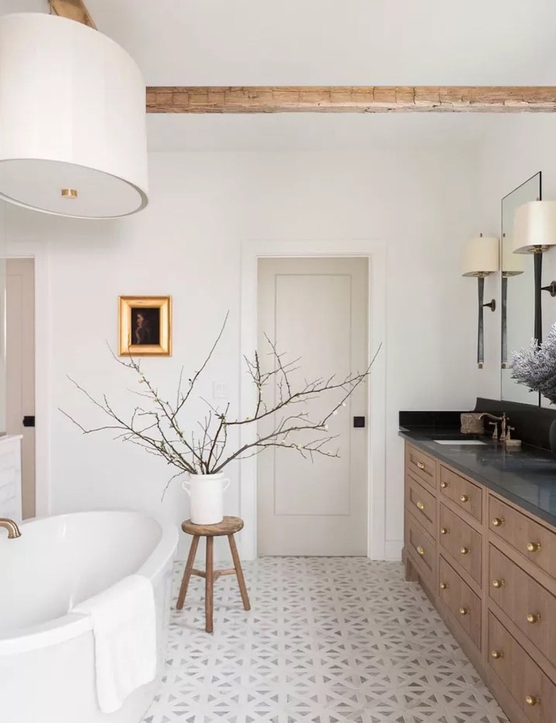 bathroom chandelier over tub with drum shade
