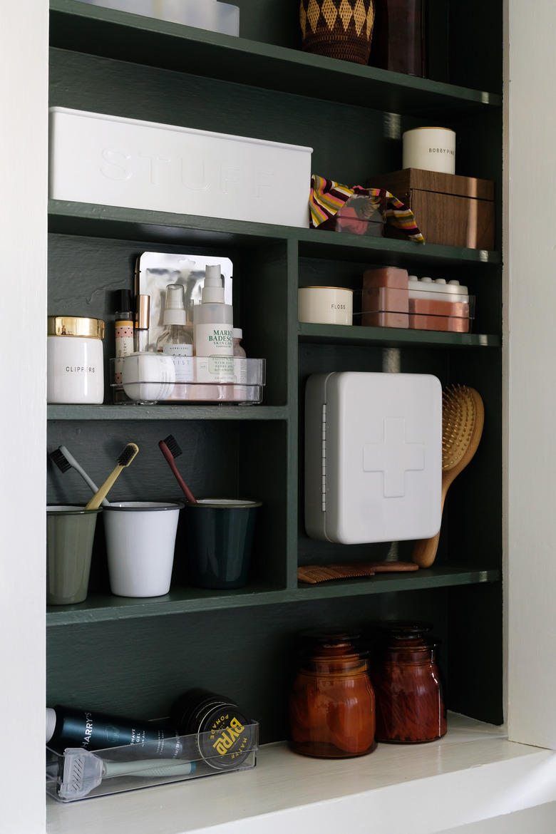 recessed medicine cabinet with green interior