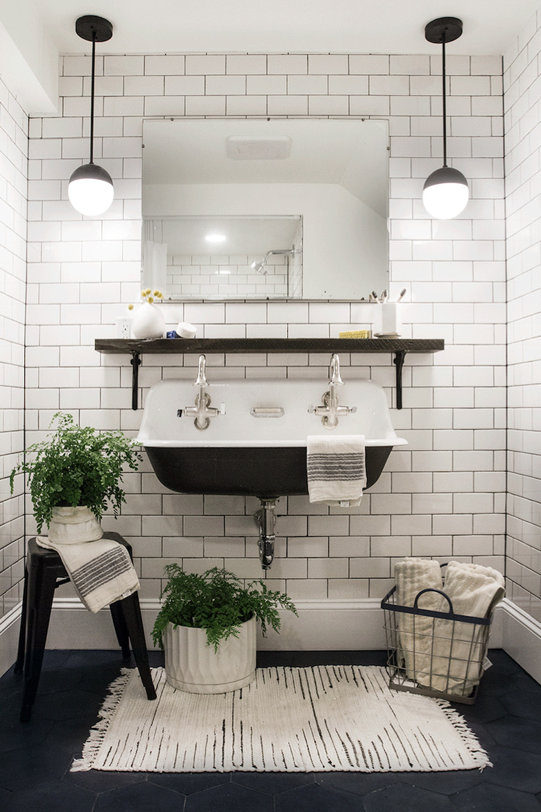 bathroom rug idea in black and white industrial bathroom