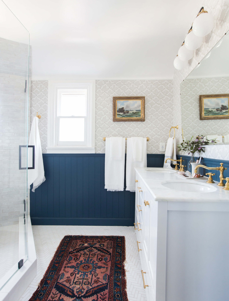 bathroom rug idea with blue vertical tongue and groove wall paneling