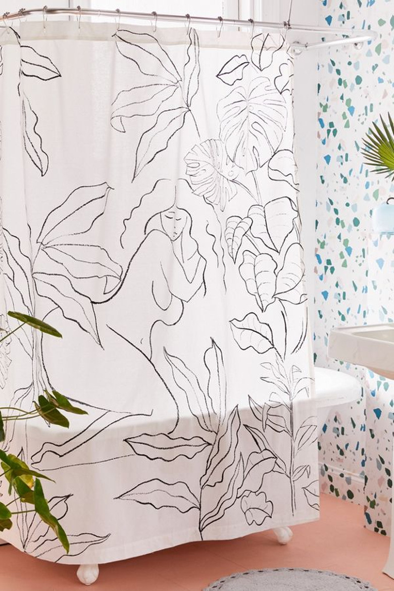 bathroom shower curtain idea with black and white figures and plants