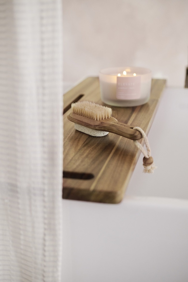 teak over the bath caddy and brush