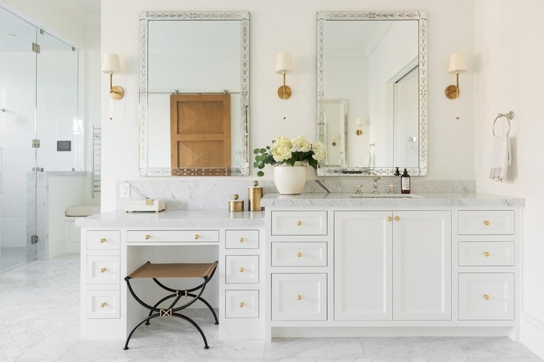 upholstered bathroom vanity lighting ideas over white cabinet
