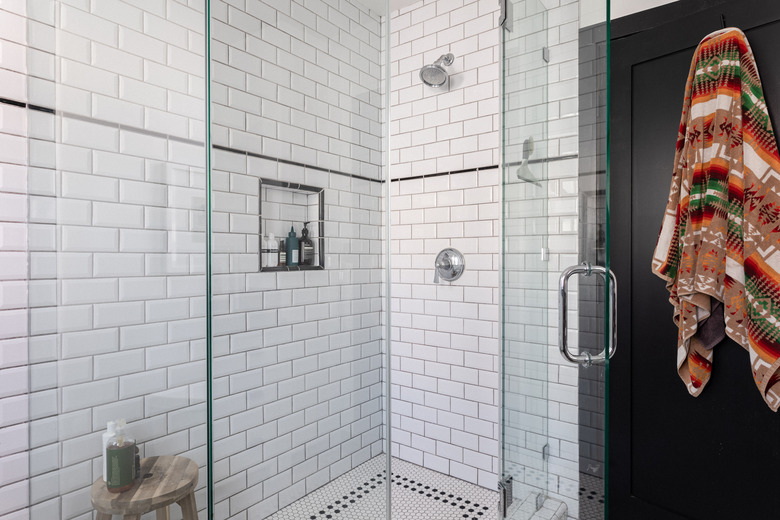 bathroom with standing shower with subway tile wall tiles