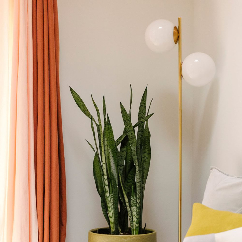 gold brass and glass globe Bedroom Floor Lampsin boho bedroom