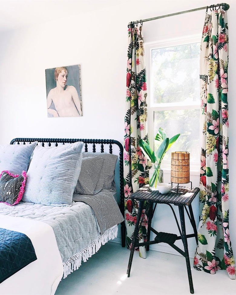 Bedroom with floral curtains