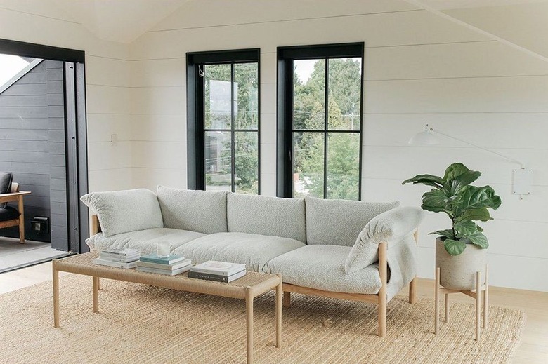 wooden and boucle couch