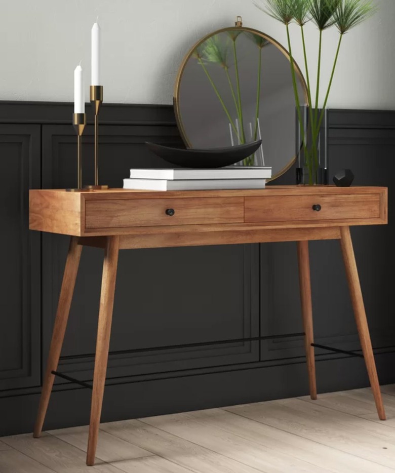Wood console table with candles