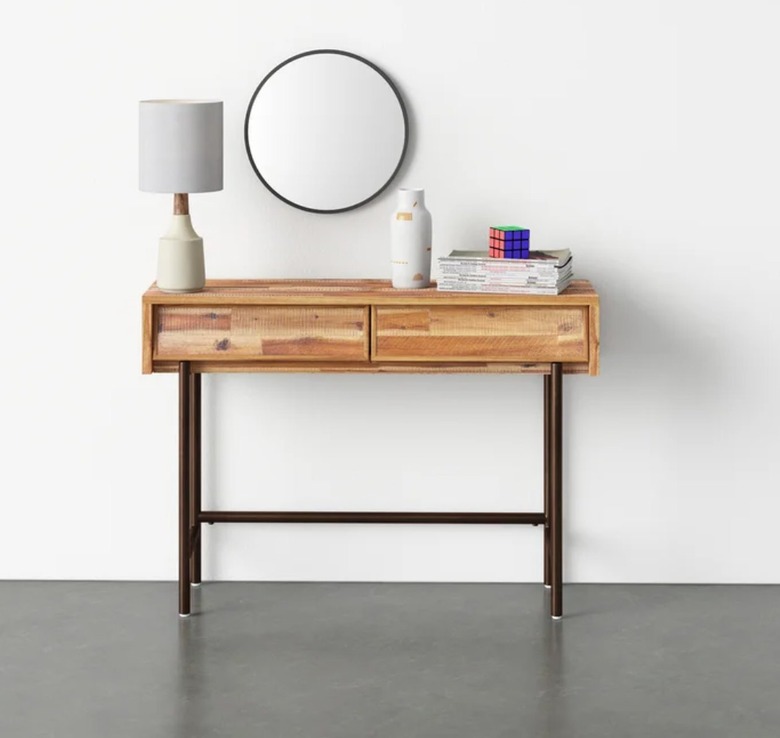 Light-wood and metal console table with drawers