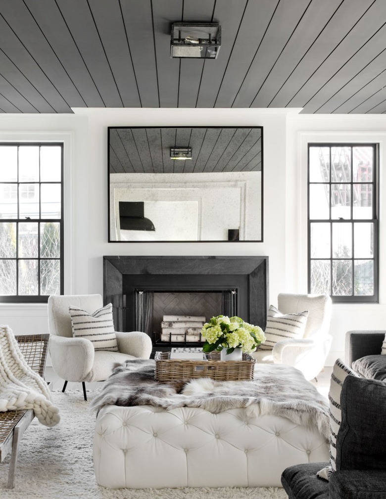 Living room with gray painted ceiling with shiplap