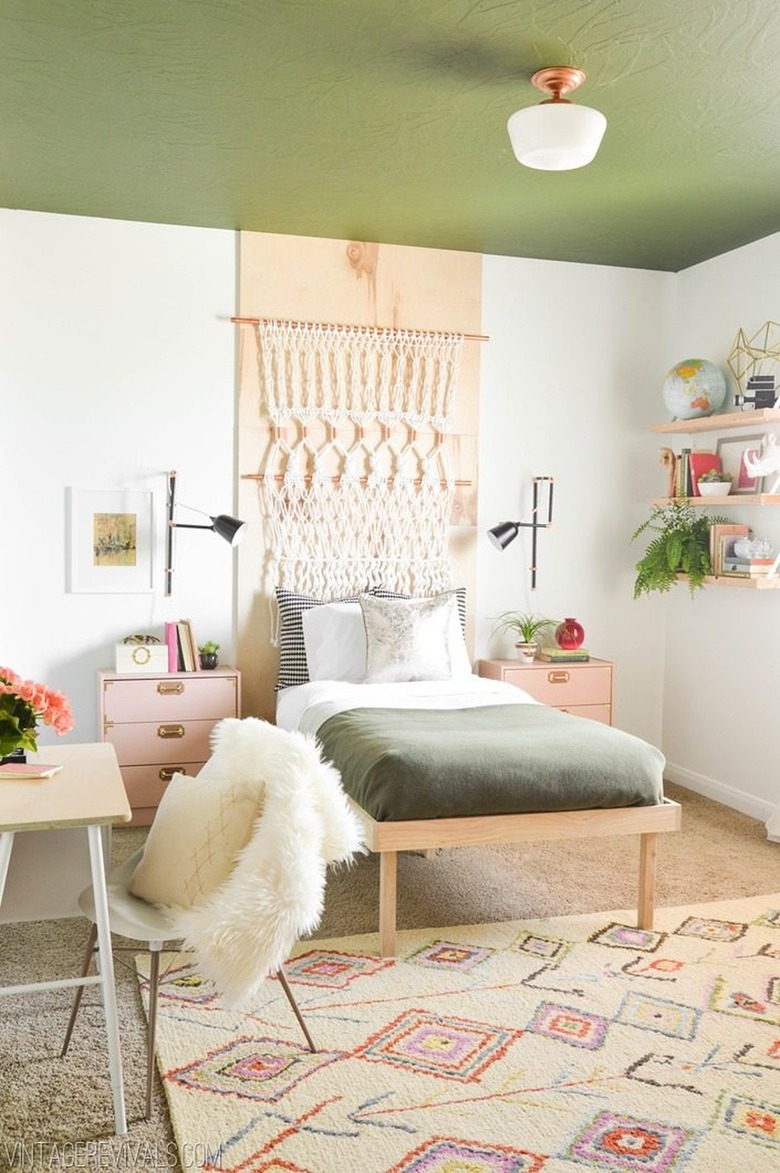 Bedroom with green painted ceiling