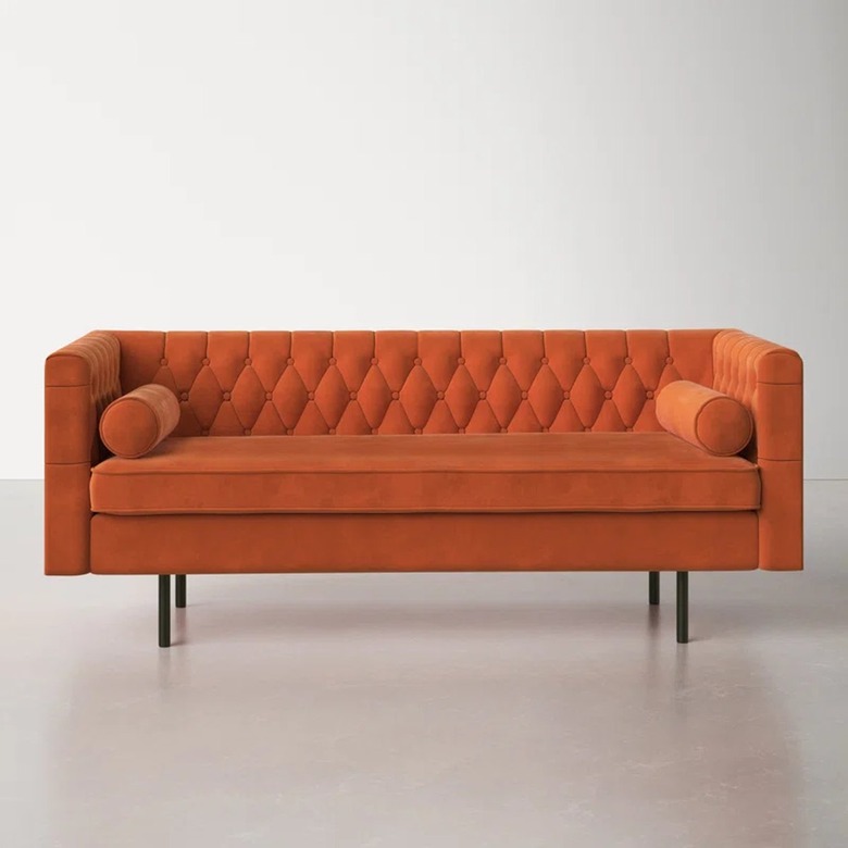 orange midcentury chesterfield