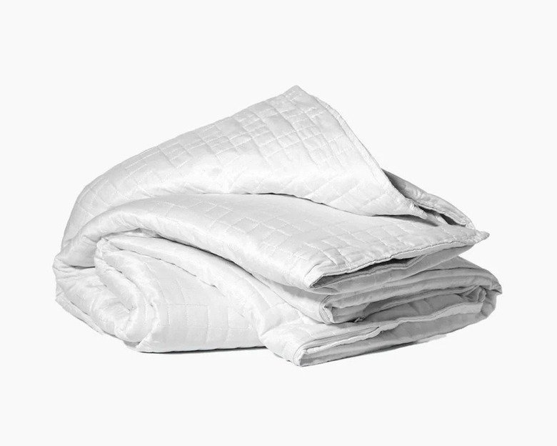 A folded white blanket