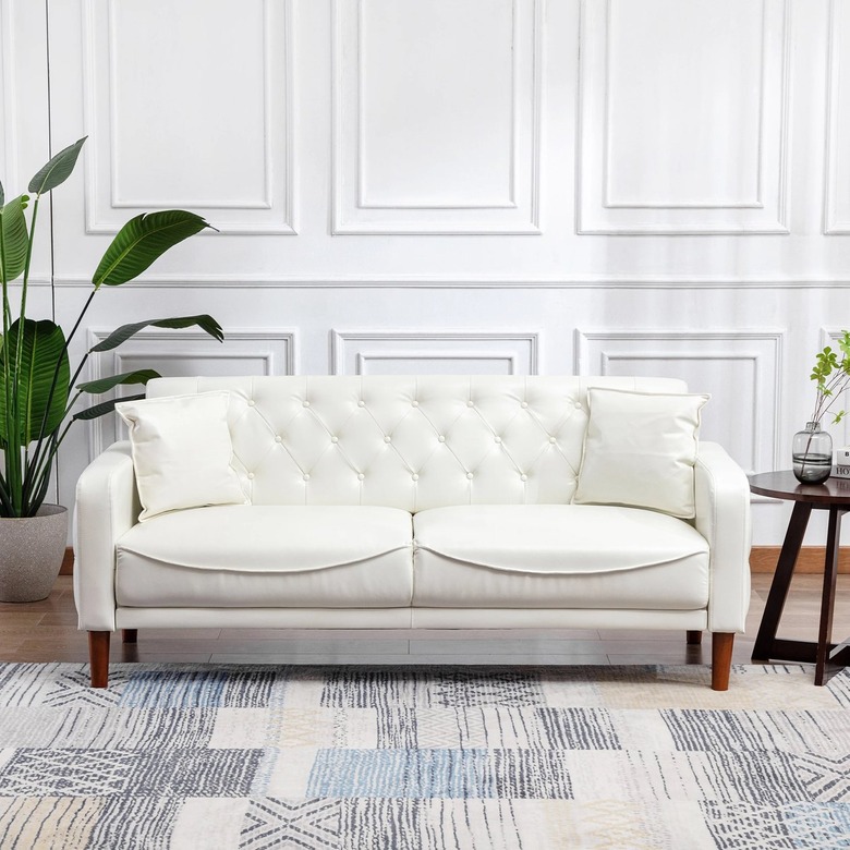 tufted faux white leather sofa with square arms