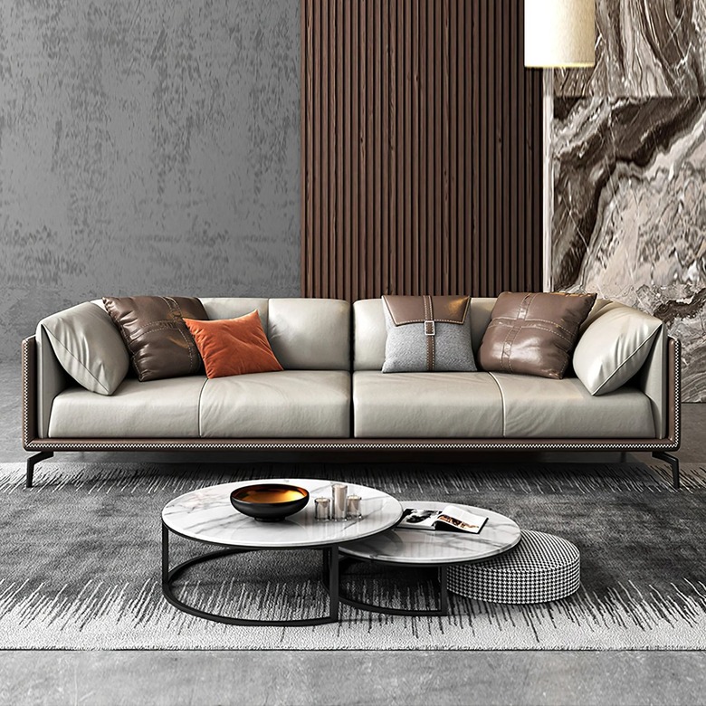 two-tone faux leather sofa with tuxedo arms