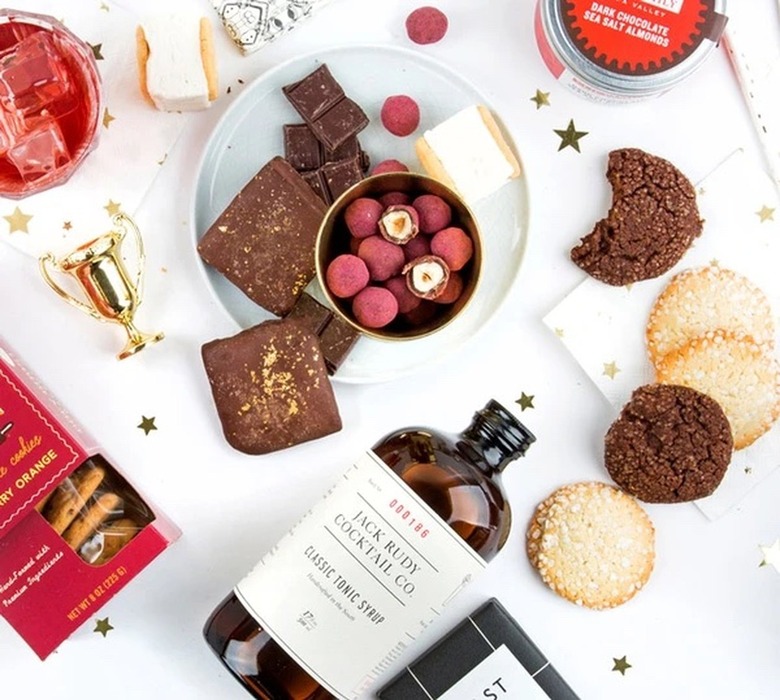 Sweets and Cocktail Mix Strewn on Table