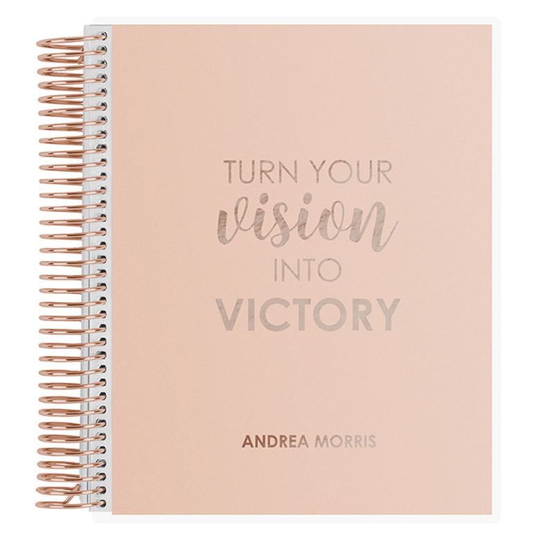 pink spiralbound journal with rose gold text