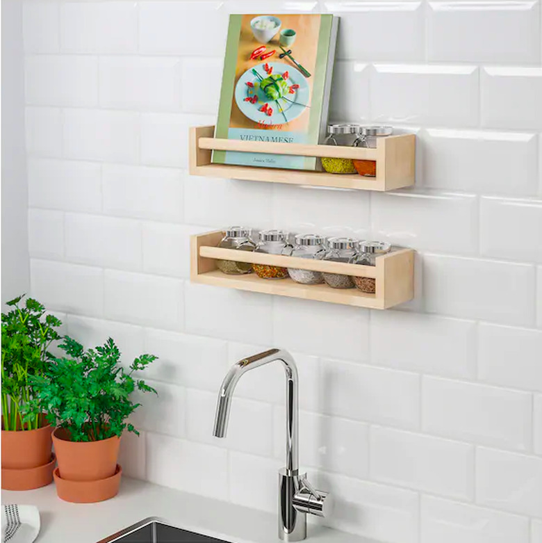 kitchen sink with shelves above it