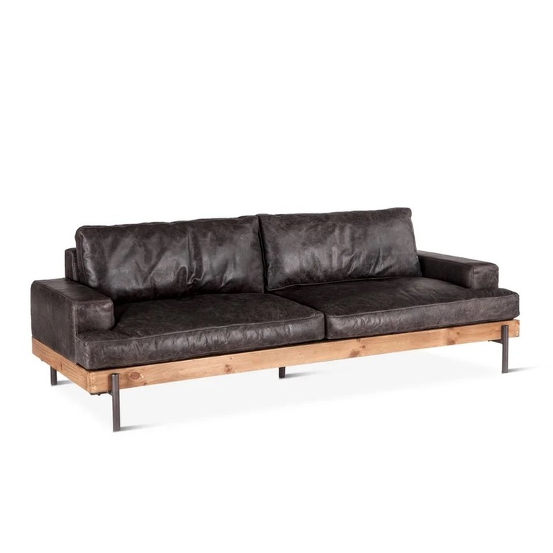 Industrial dark leather couch with wood