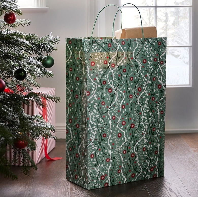 A tall gift bag in a red