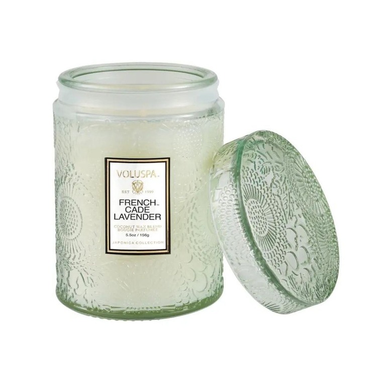 luxury candle with floral pattern vessel