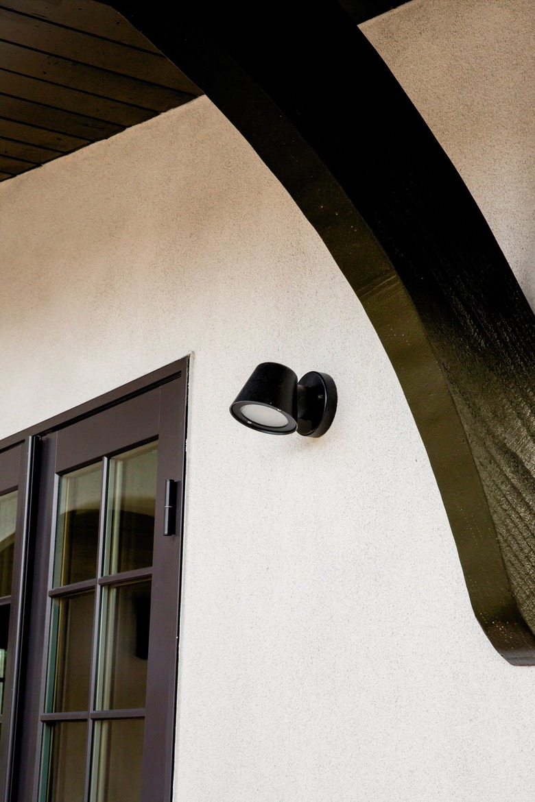 exterior door with motion detecting floodlight