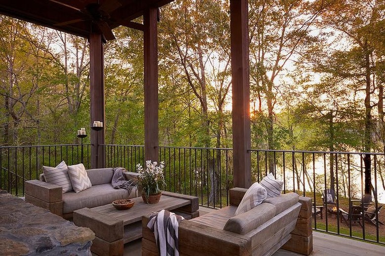 outdoor patio with couches and candles