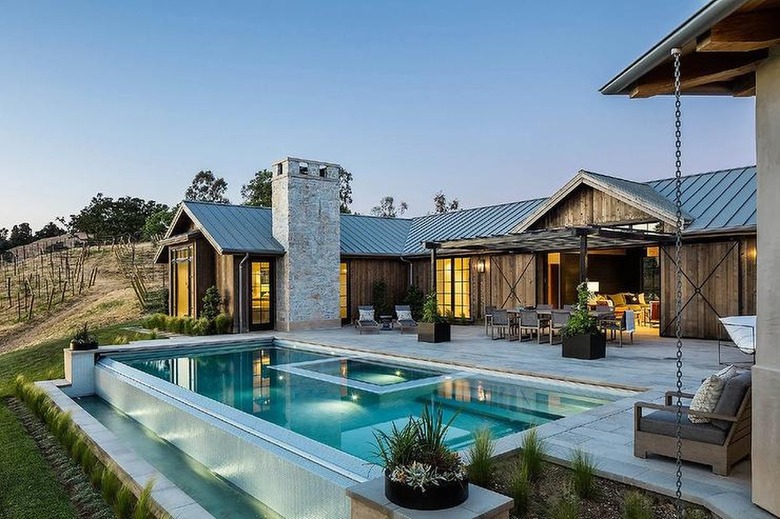 swimming pool in backyard with underwater lights