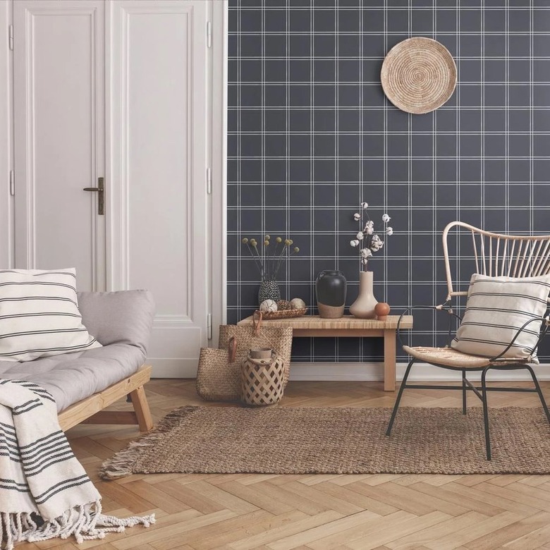 Plaid wallpaper in monochromatic living space