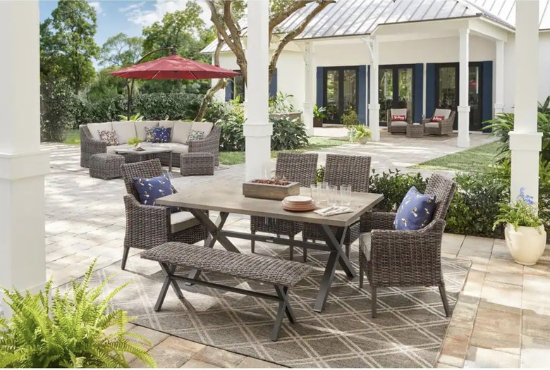 brown outdoor furniture set on back patio