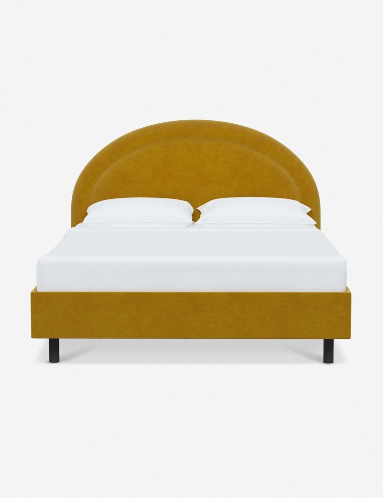 goldenrod velvet platform bed with arched headboard