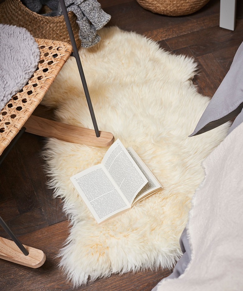 trendy affordable sheepskin rug on floor