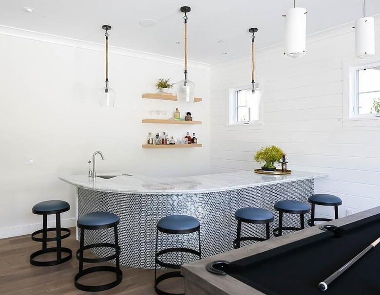 freestanding bar with plenty of bar stools