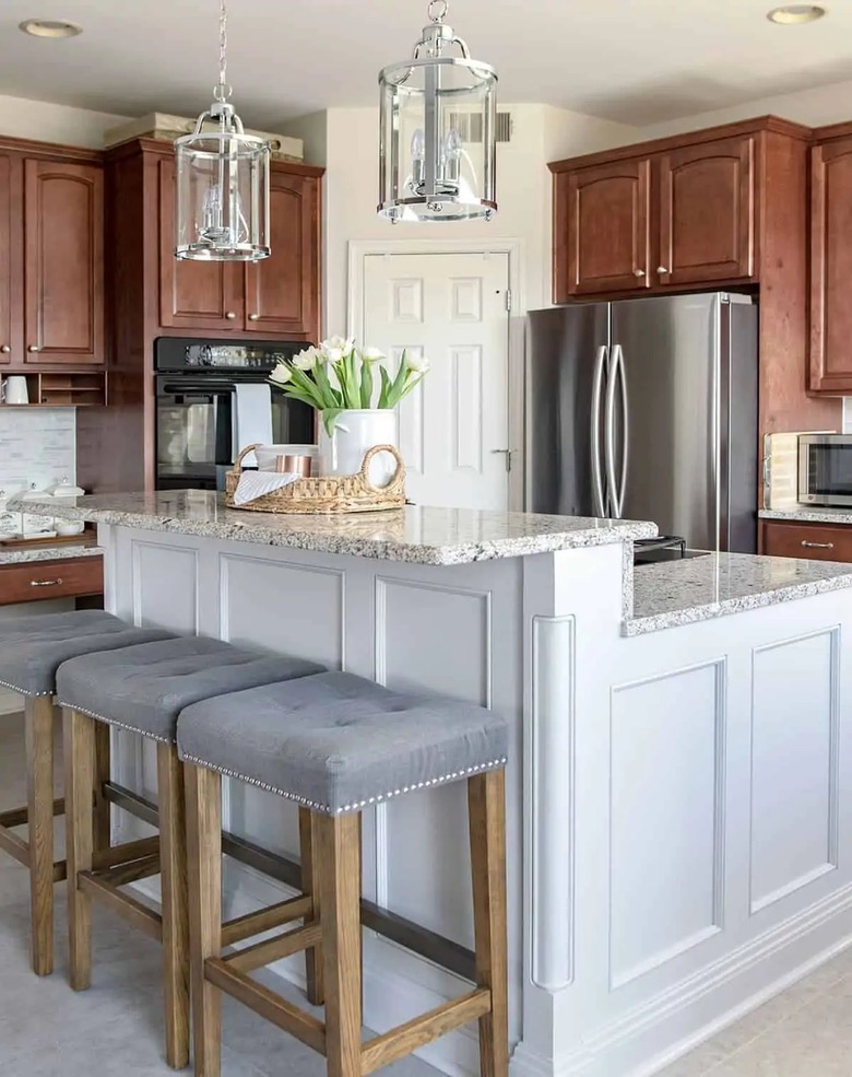 white granite countertop on island in traditional kitchen