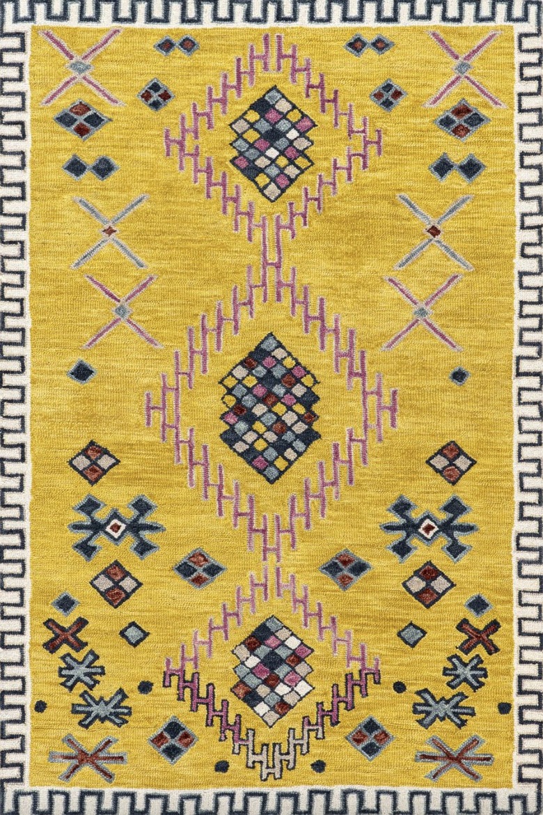 yellow rug with pattern