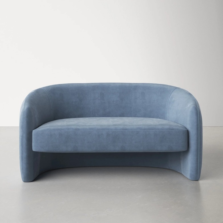 curved blue sofa