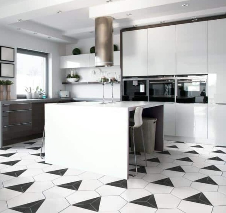 contemporary white kitchen with black diamond tile