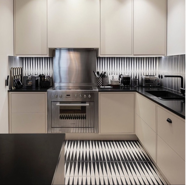 greige cabinets with backgammon tile