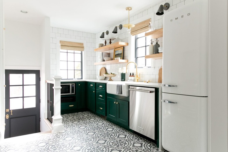 black and white kitchen floor tiles in green kitchen