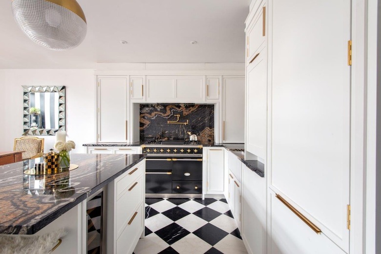 checkerboard black and white kitchen floor tiles in luxe kitchen
