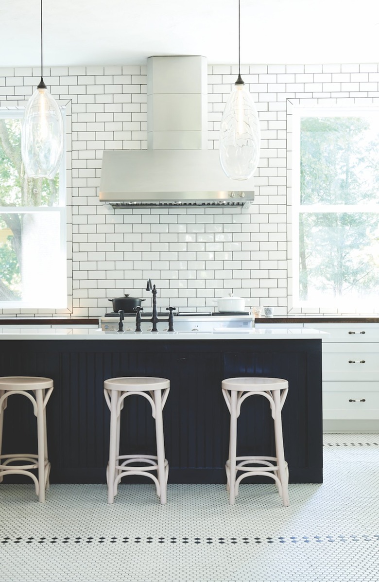 white kitchen with black island