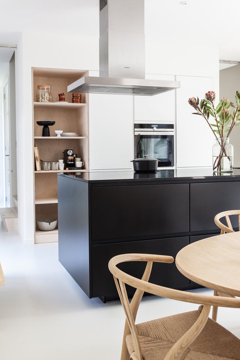 black kitchen island with clean lines